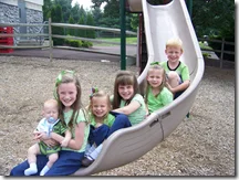 The youngest six enjoying the playground while the oldest four are in college :)