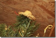 Hmmmm... as a tree topper, that cute little hat isn't so cute. ;) Sorry guys!