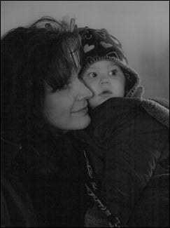 Listening closely to the tour guide in the Governor's Palace, and enjoying snuggle time with Motherkin